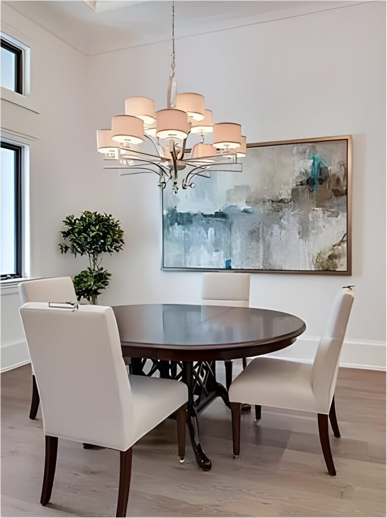 Elegant Dining Room With Dark Wood Round Table